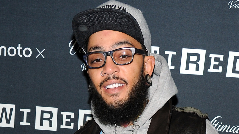 Travie McCoy smiling