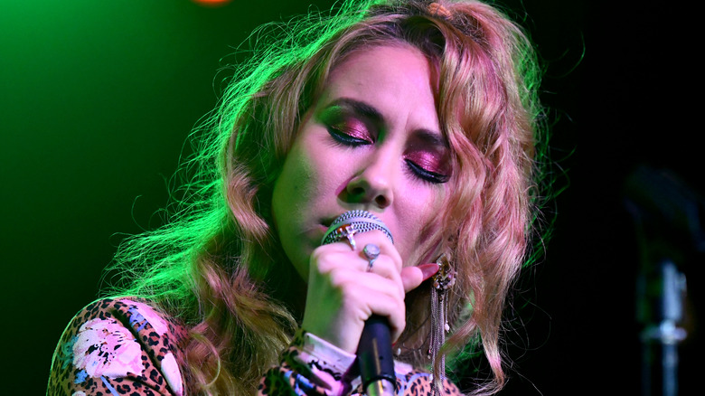 Haley Reinhart on stage, singing