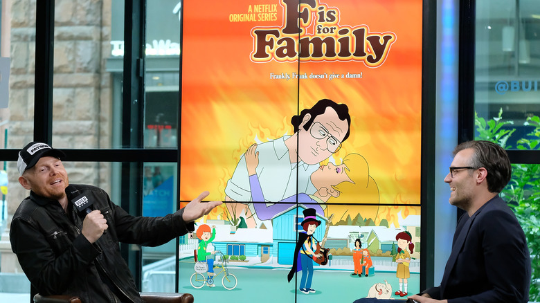 Bill Burr being interviewed in front of "F Is For Family" ad