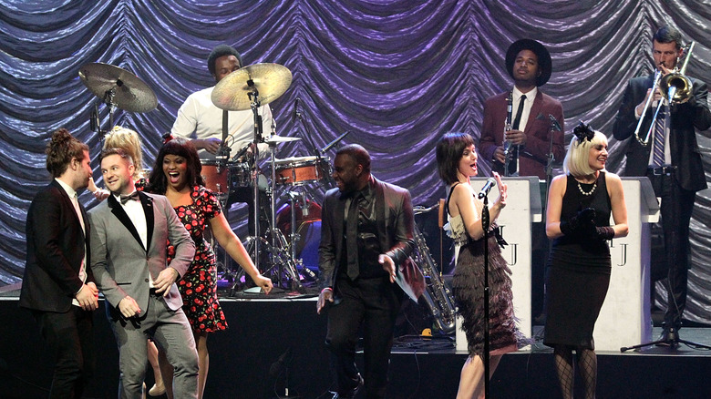 Postmodern Jukebox on stage performing