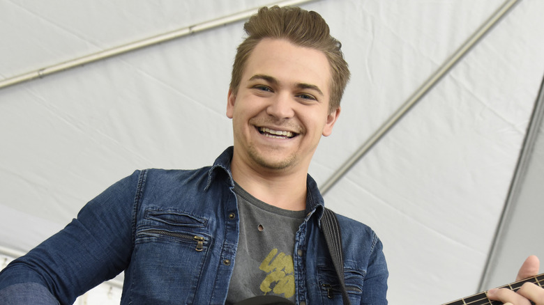 Hunter Hayes smiling with guitar