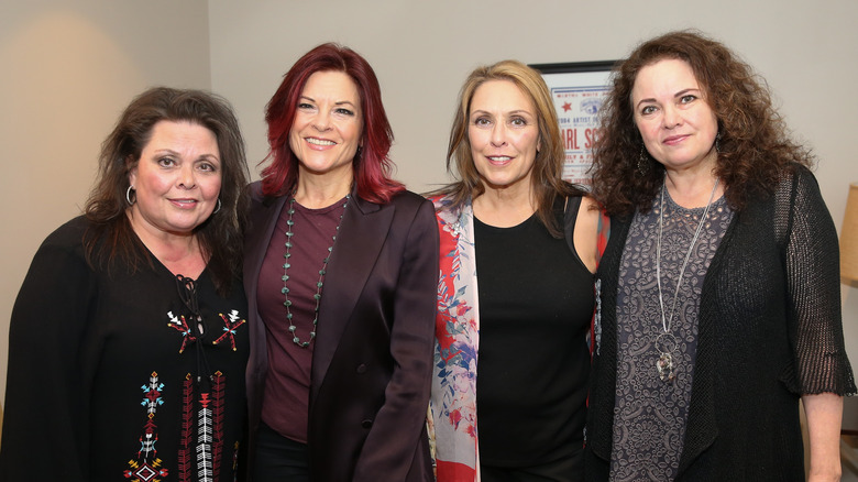 Kathy, Roseanne, Cindy, and Tara Cash posing for pictures