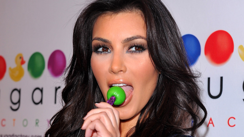 Kim Kardashian with a lolipop