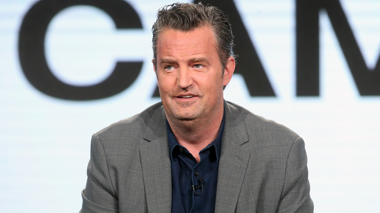 Matthew Perry in suit jacket