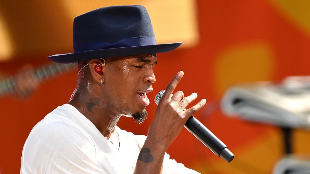 Ne-Yo performing on stage 