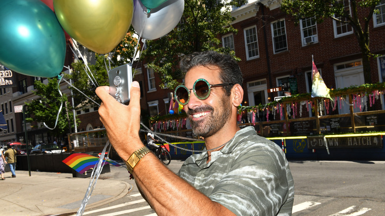 Nyle DiMarco with balloons