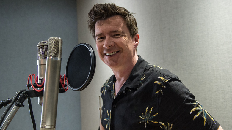 Rick Astley in the studio, smiling