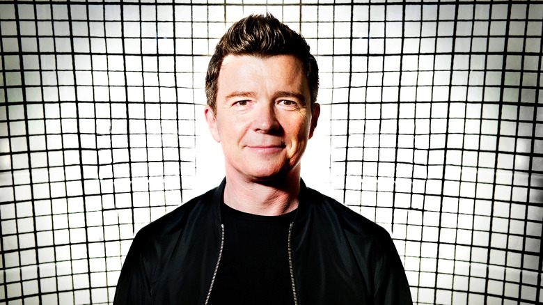 Rick Astley with checkered background