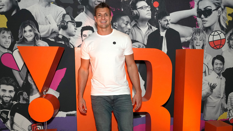 Rob Gronkowski wearing a white t-shirt and jeans