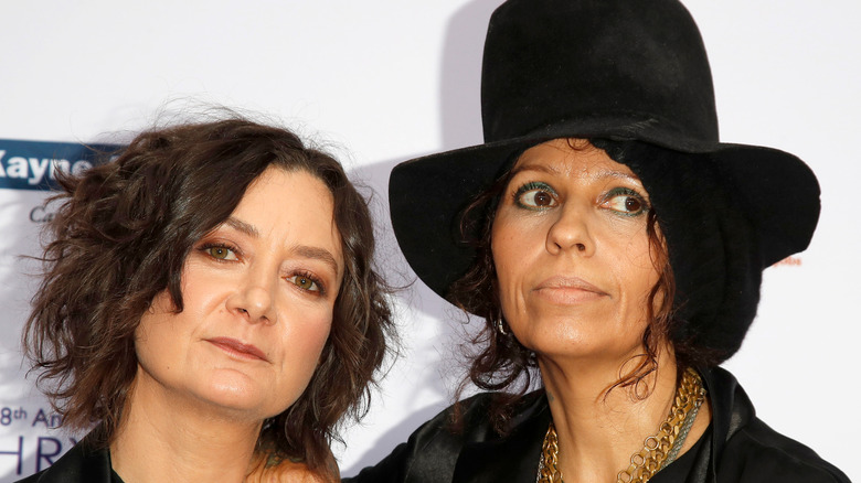 Sara Gilbert and Linda Perry post