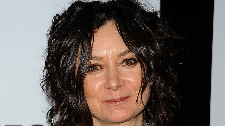 Sara Gilbert posing on red carpet