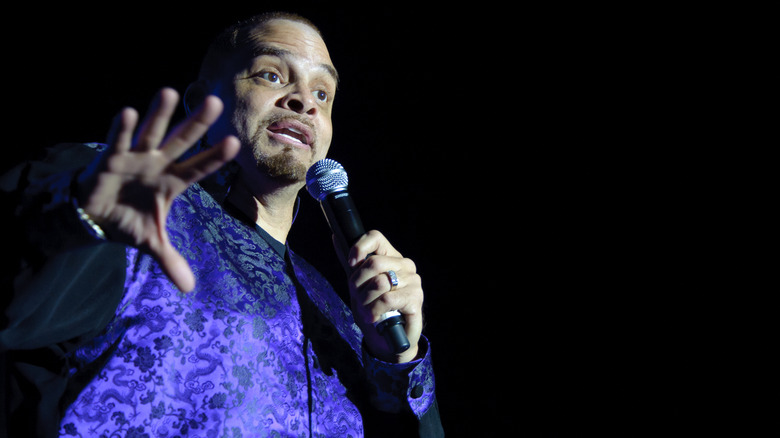 Sinbad talking in a microphone