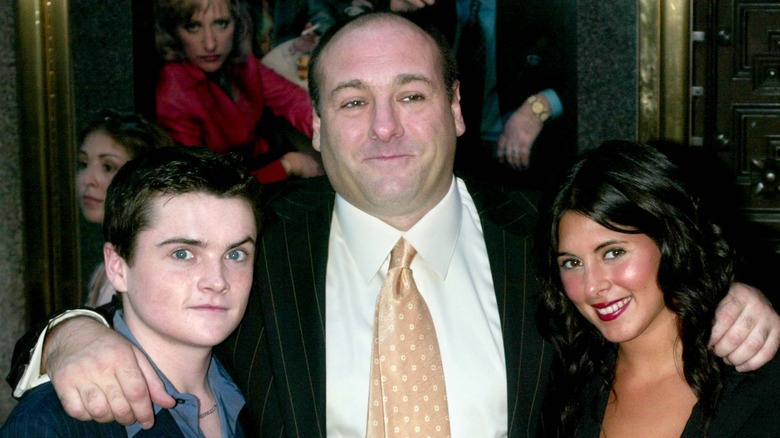 Robert Iler, James Gandolfini, and Jamie-Lynn Sigler smiling