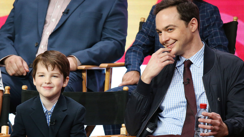 Iain Armitage and Jim Parsons sit on stage