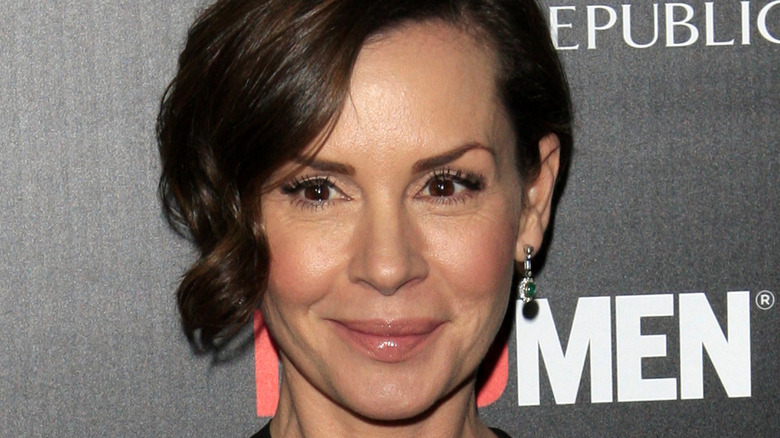 Embeth Davidtz smiling