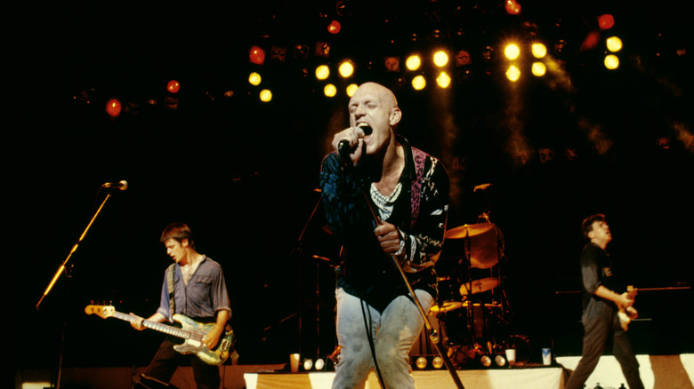 Midnight Oil performing on stage