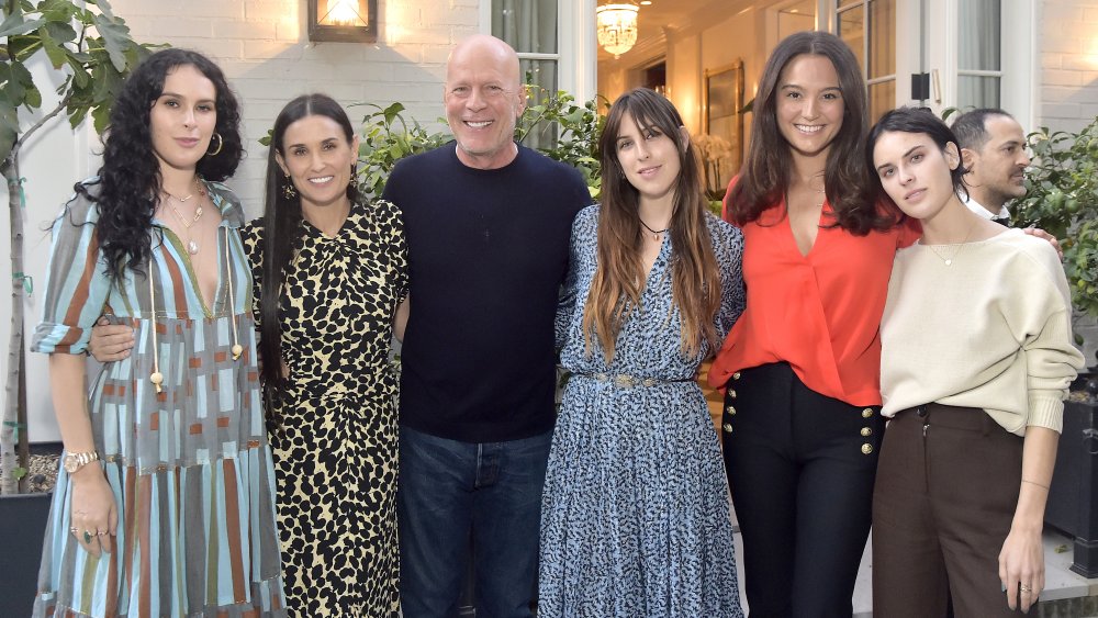 Bruce Willis with his ex-wife, Demi Moore, their kids, and his current wife Emma Heming Willis 