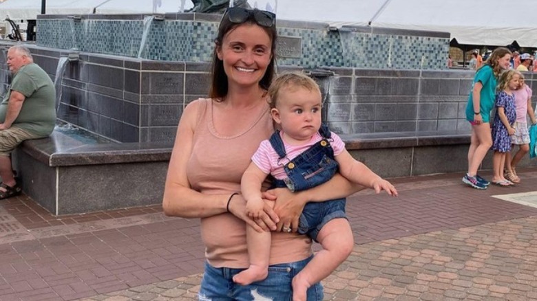 Tiffany Copeland and her daughter exploring a boat