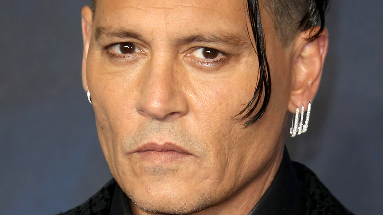 Johnny Depp short hair earrings