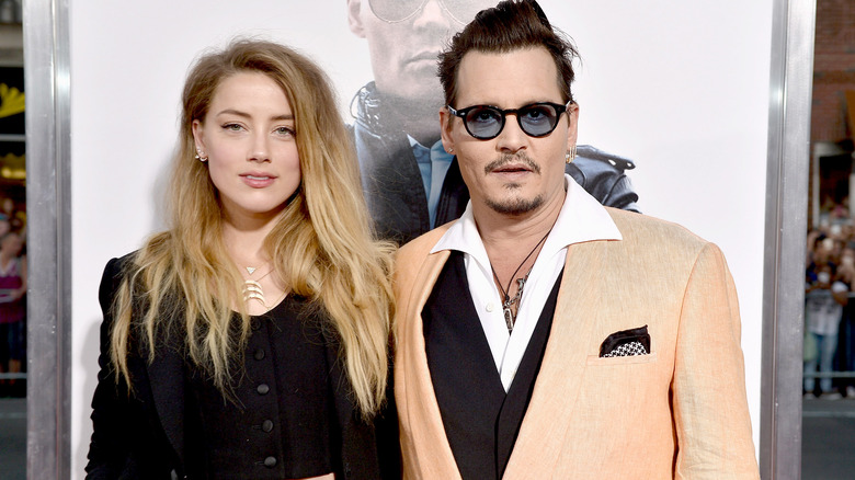 Johnny Depp Amber Heard posing