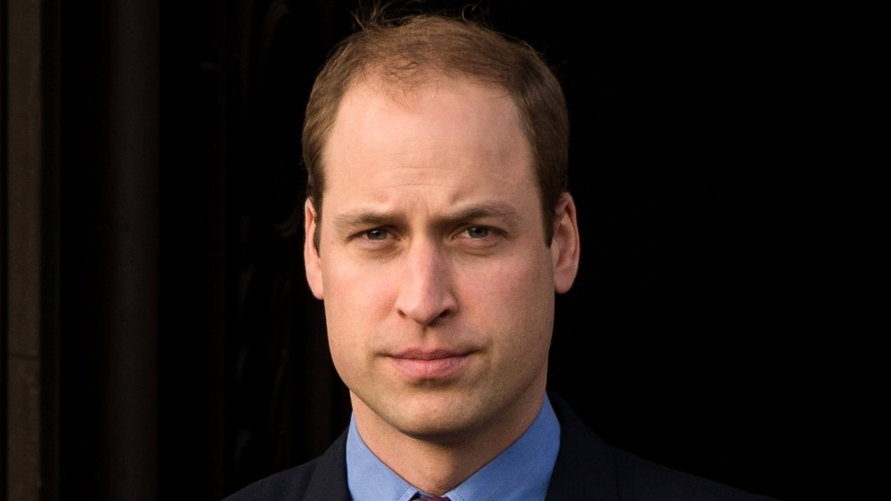 Prince William with a serious expression