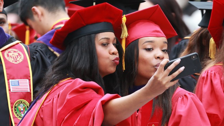 Two USC students at graduation