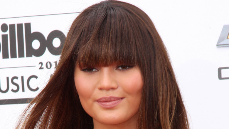 Chrissy Teigen with bangs