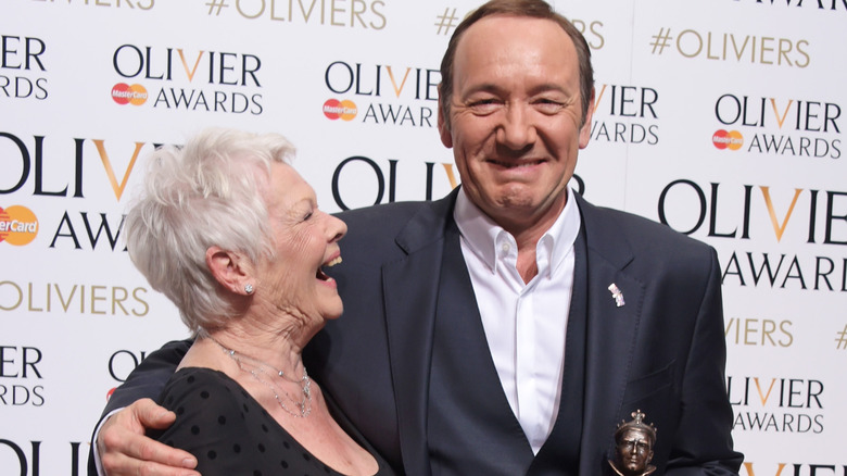 Kevin Spacey and Judi Dench laughing 