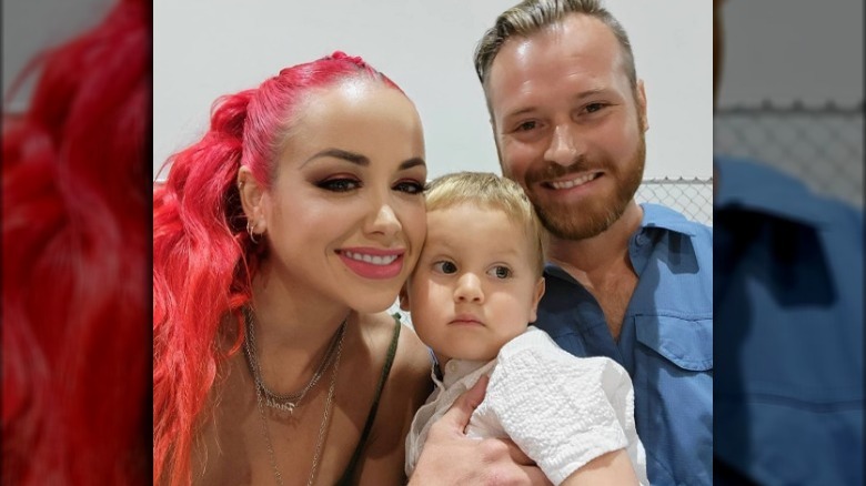 Paola and Russ Mayfield in a selfie with their son Axel from Instagram