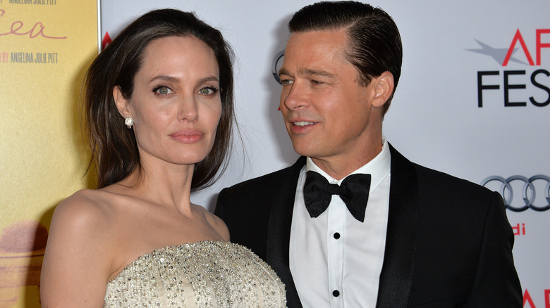 Brad Pitt looking at Angelina Jolie