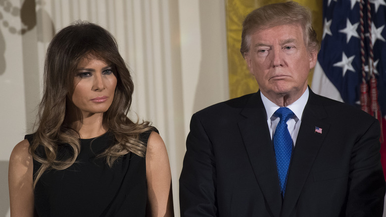 Melania Trump and Donald Trump posing