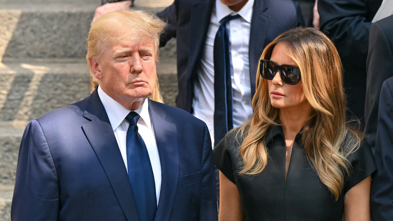 Donald and Melania Trump looking serious