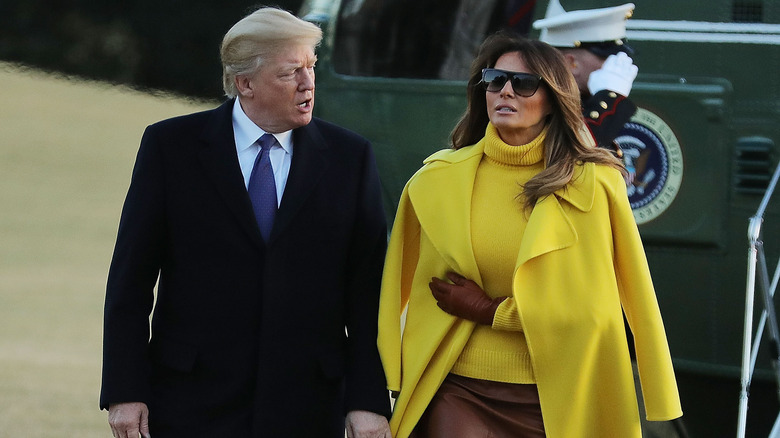 Donald Trump and Melania Trump walking