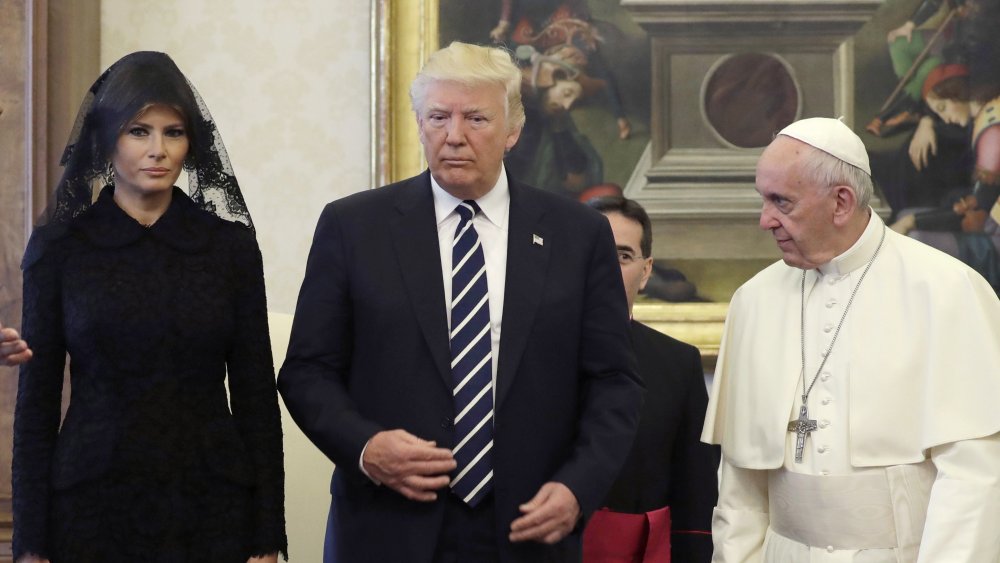 Melania Trump, Donald Trump, and Pope Francis walking