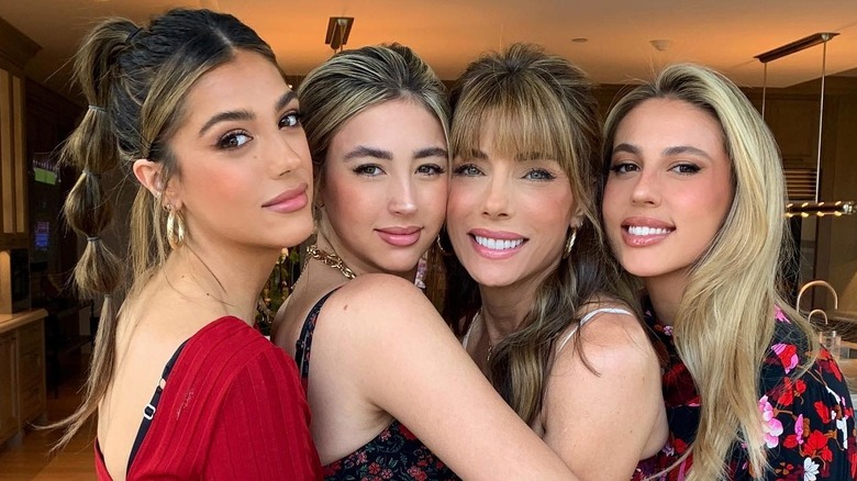 Jennifer Flavin and her three daughters hugging