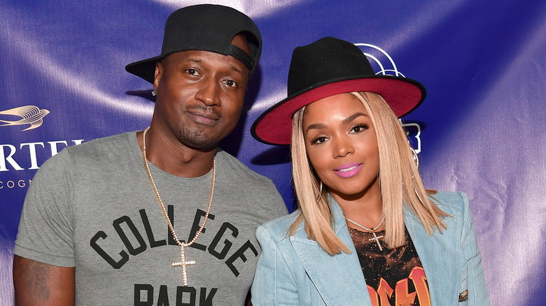 Kirk and Rasheeda Frost, 2018 photo, both wearing hats and smiling