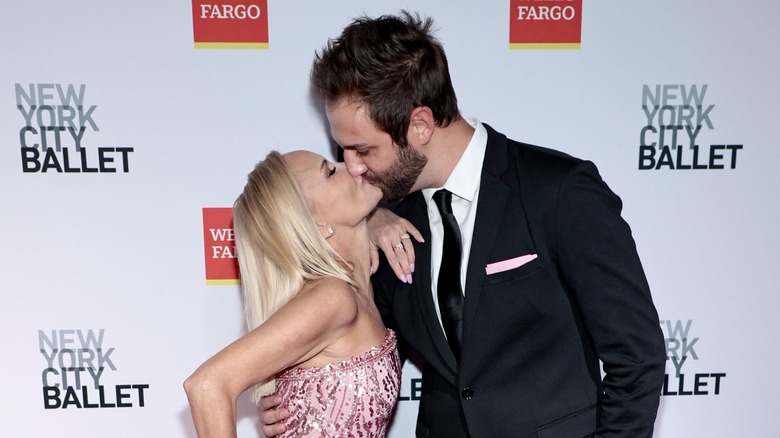 Kristin Chenoweth and Josh Bryant kiss