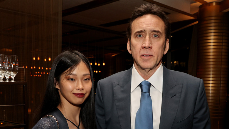 Nicolas Cage and Riko Shibata at an event 