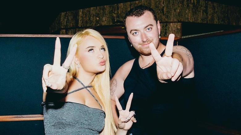 Sam Smith and Kim Petras peace signs