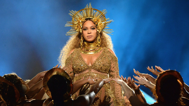 Beyonce wearing gold headpiece