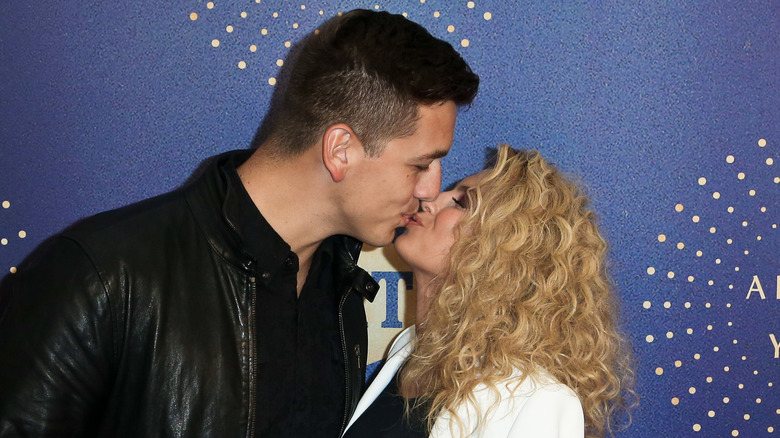 Tori Kelly kissing her husband