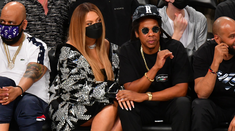 Beyoncé and Jay-Z at a basketball game in 2021