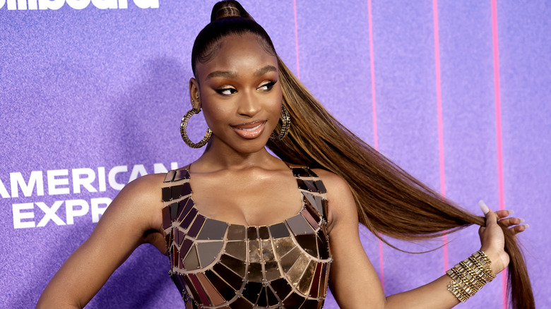 Normani holding ponytail