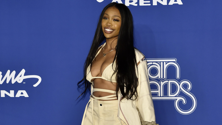 SZA smiling at event