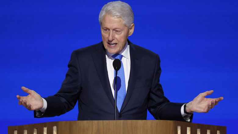 Bill Clinton speaking on stage