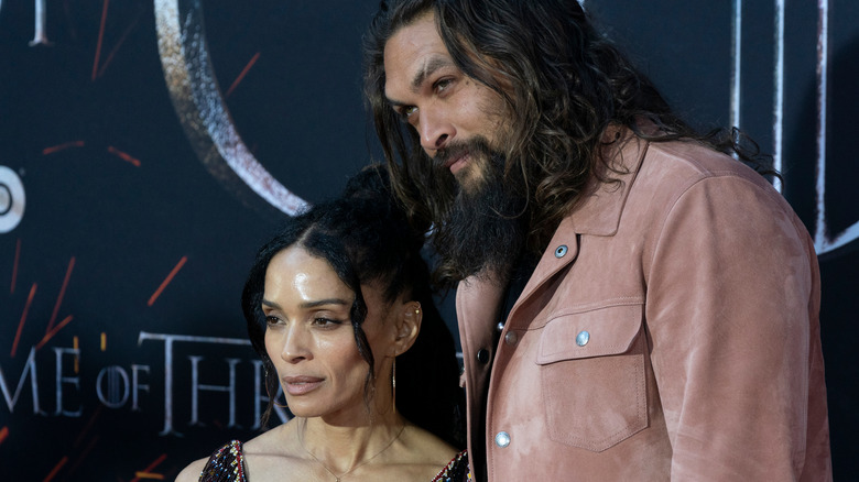 Lisa Bonet and Jason Momoa looking off