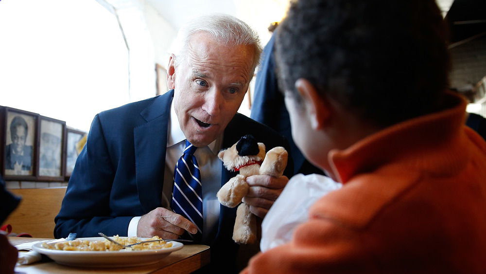 Joe Biden with toy dog Champ