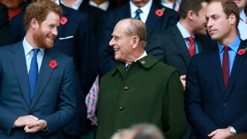 Prince Harry, Prince Philip, and Prince William laughing