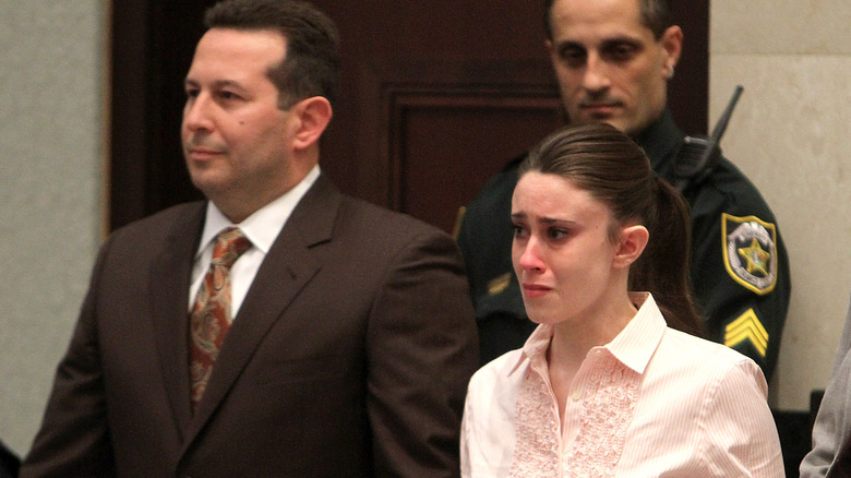 Casey Anthony, with her lawyer, during her 2011 trial, crying after being aquitted