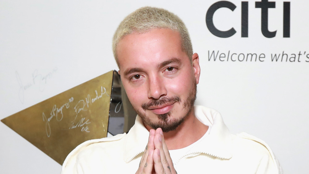 J Balvin with praying hands